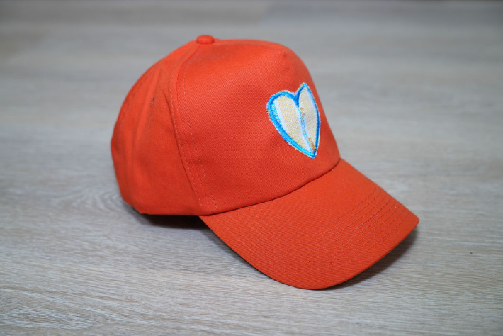 Orange Hat with Embroidered Heart Patch