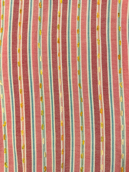 Pink stripe fabric close up 