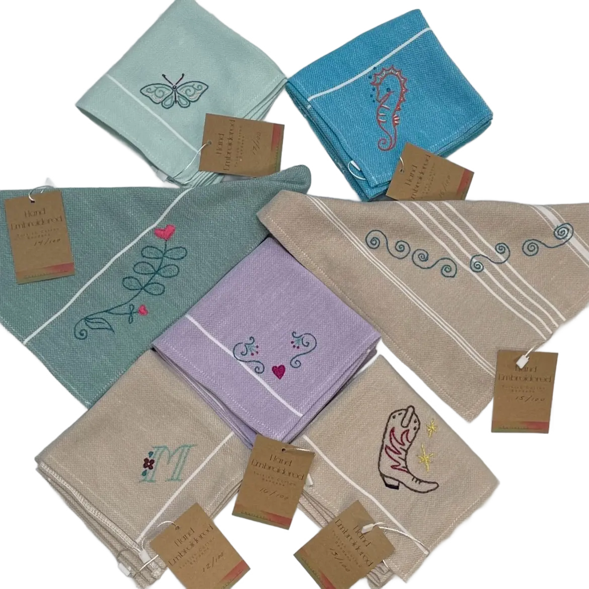 Set of embroidered bandanas with various designs on a white background