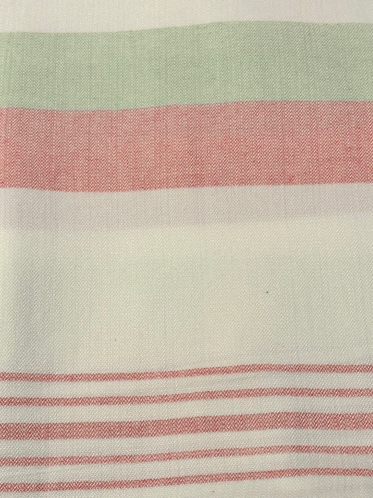 Pink and green striped fabric closeup